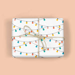 Load image into Gallery viewer, holiday string lights gift wrap
